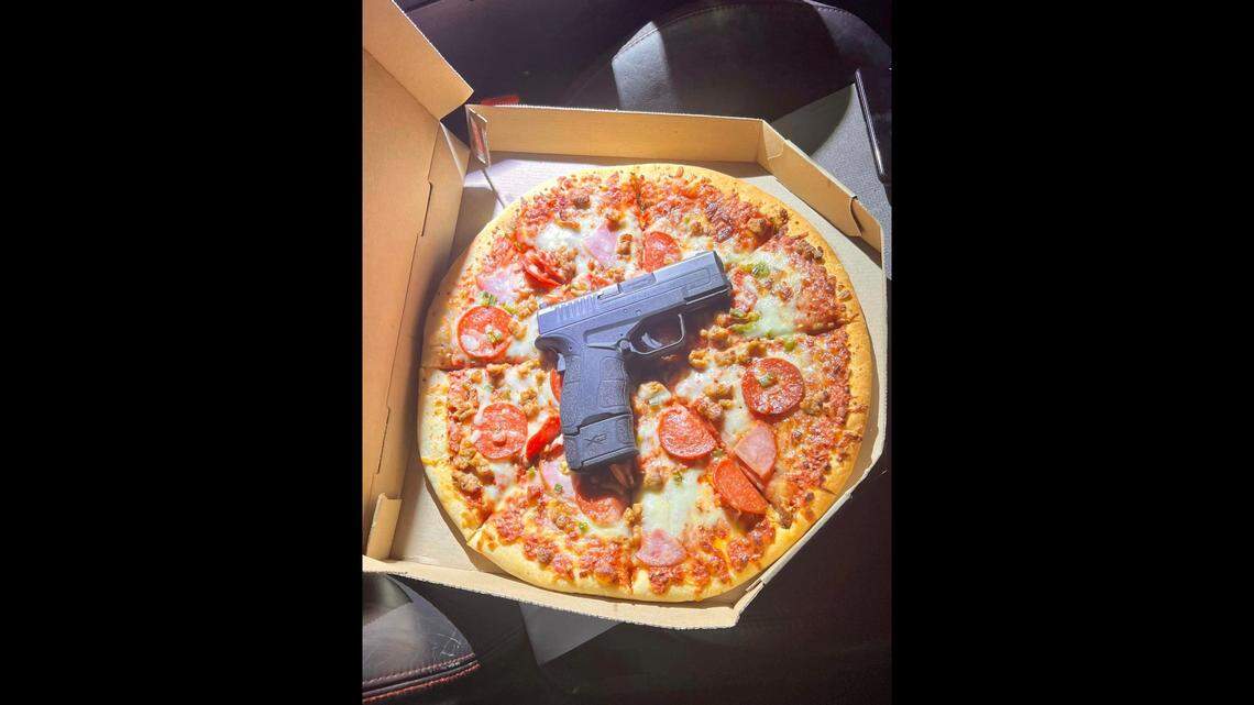 Deputies who stopped a vehicle in Kern County found a loaded handgun inside a pizza box, California officials say.
