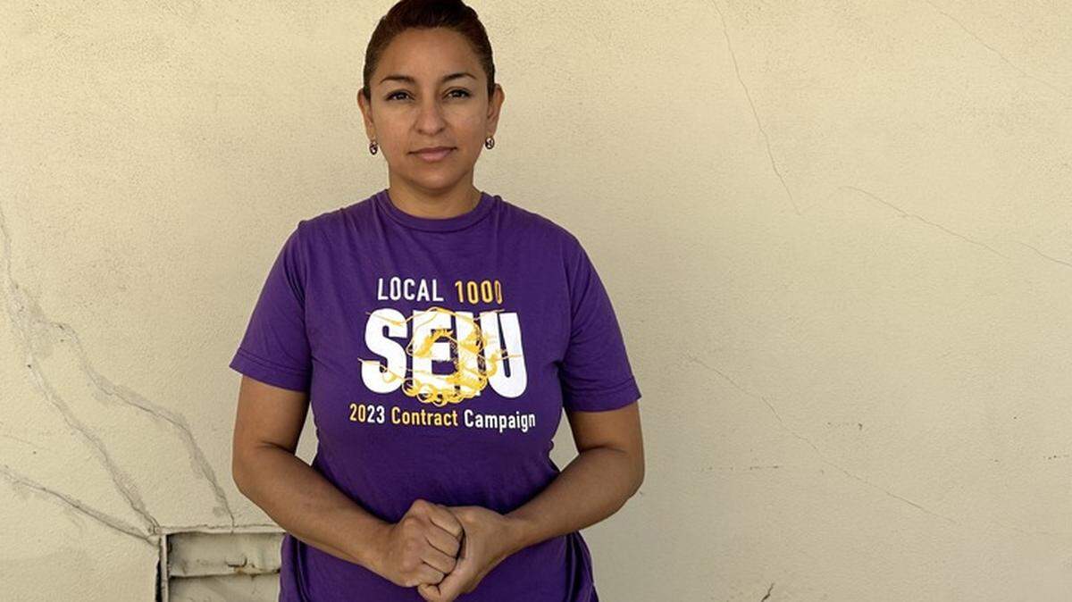 Norma Murillo, 42, stands in her San Diego home on Friday. Murillo works as a staff services analyst for California’s Department of Justice and says she struggles to afford basic expenses like rent, groceries and gasoline.