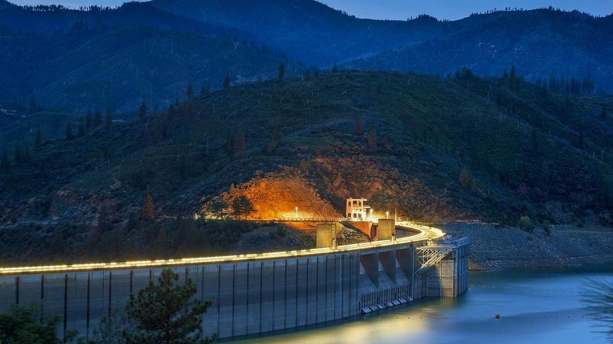 Shasta Dam holds back the water of Shasta Lake on June 3, 2015.