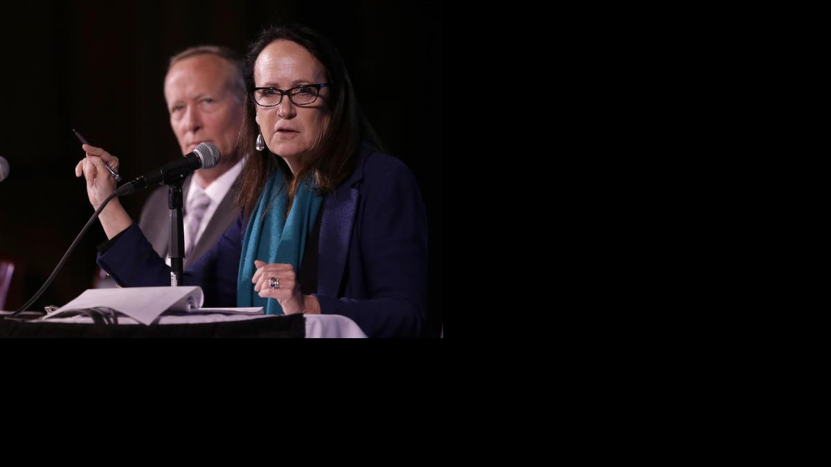 
Felicia Marcus, state water resources control chief, wants more “pop per drop.” At left is Kevin Hunting, chief deputy director of the California Department of Fish and Game.
