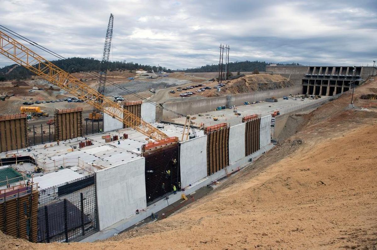 Fixing the two spillways turned into an $875 million job that wouldn’t be finished until the fall of 2018, although DWR promised the structures would be safe enough for the 2017-18 rainy season. Here, crews work on the repaired wall of the main spillway in mid-October.
