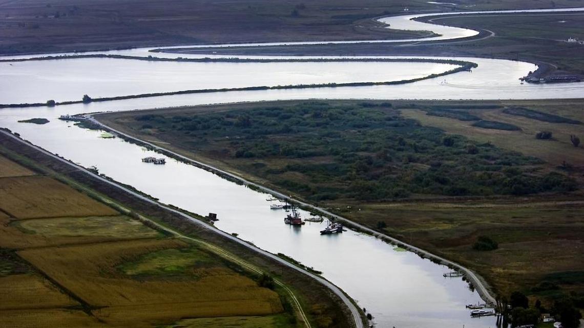 San Joaquin County and a group of Delta farmers allege that the pending $175 million purchase by the Metropolitan Water District of Southern California represents a breach of contract.