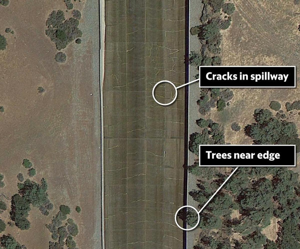 In this satellite image from 2010, Bea points out the many cracks on the surface of the spillway and the trees growing too close to the edge of the structure.