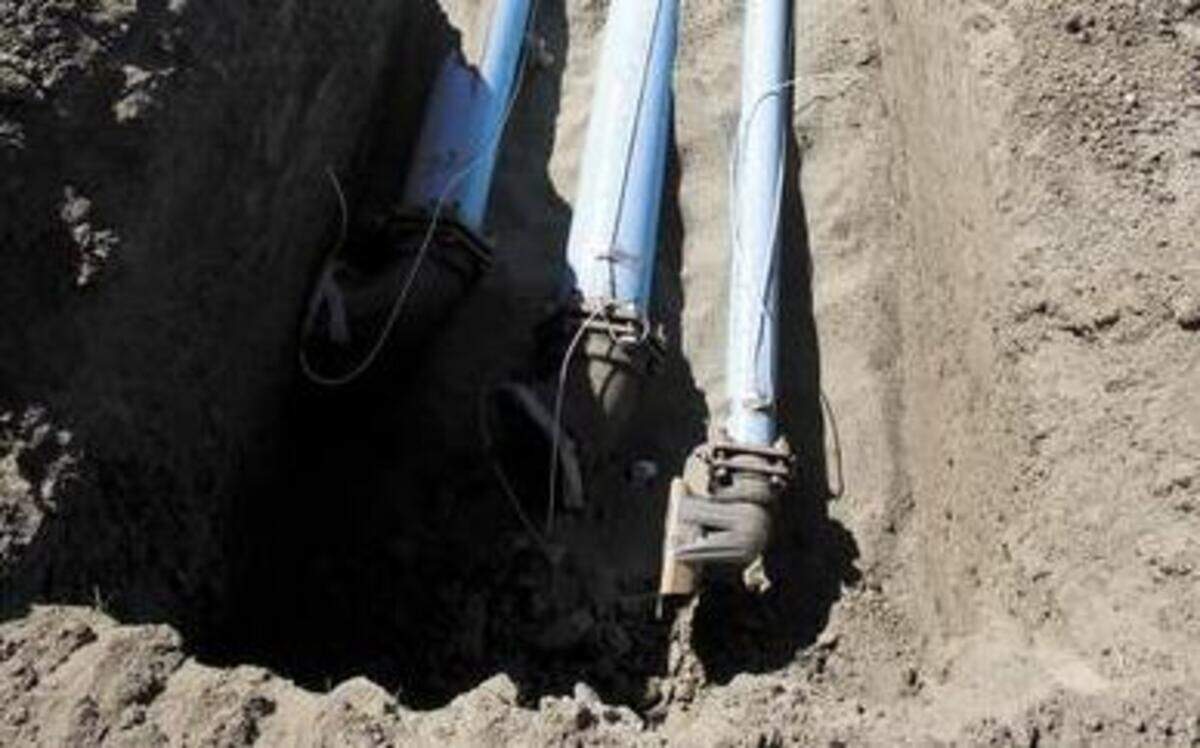 
Cambria Community Services District employees work on a desalination plant set to open this month in the coastal town of Cambria.


