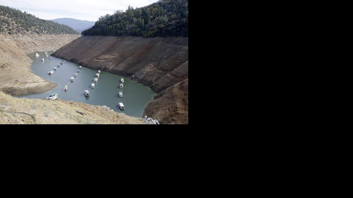 
Houseboats sit in the drought-affected waters of Lake Oroville, one of California’s most important reservoirs, last October. As the drought worsens, the Metropolitan Water District of Southern California plans to spend up to $71 million to buy water from farmers in the Sacramento Valley. 

