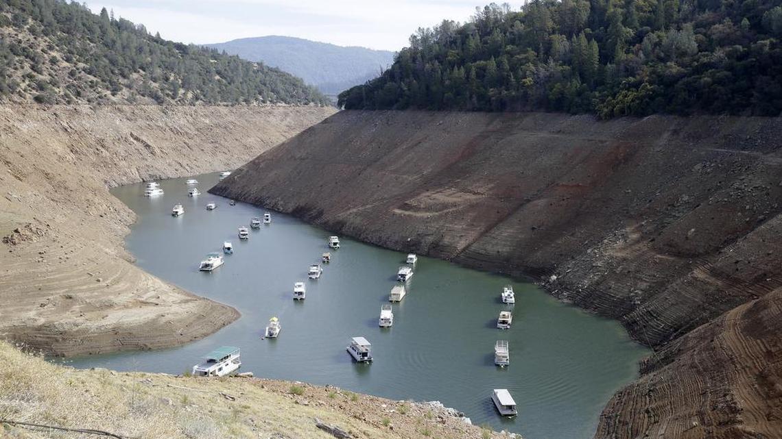 Houseboats sit in drought-ravaged Lake Oroville last February. With the lake just 39 percent full, state officials are cautious about increasing deliveries to customers of the State Water Project.