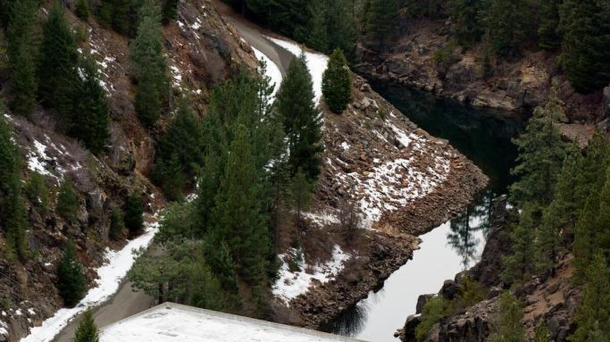 A sparse amount of snowfall surrounds SMUD’s Union Valley hydroelectric plant on the Upper American River in El Dorado County in January 2014. A new study says climate change will shorten winters, straining water supplies.