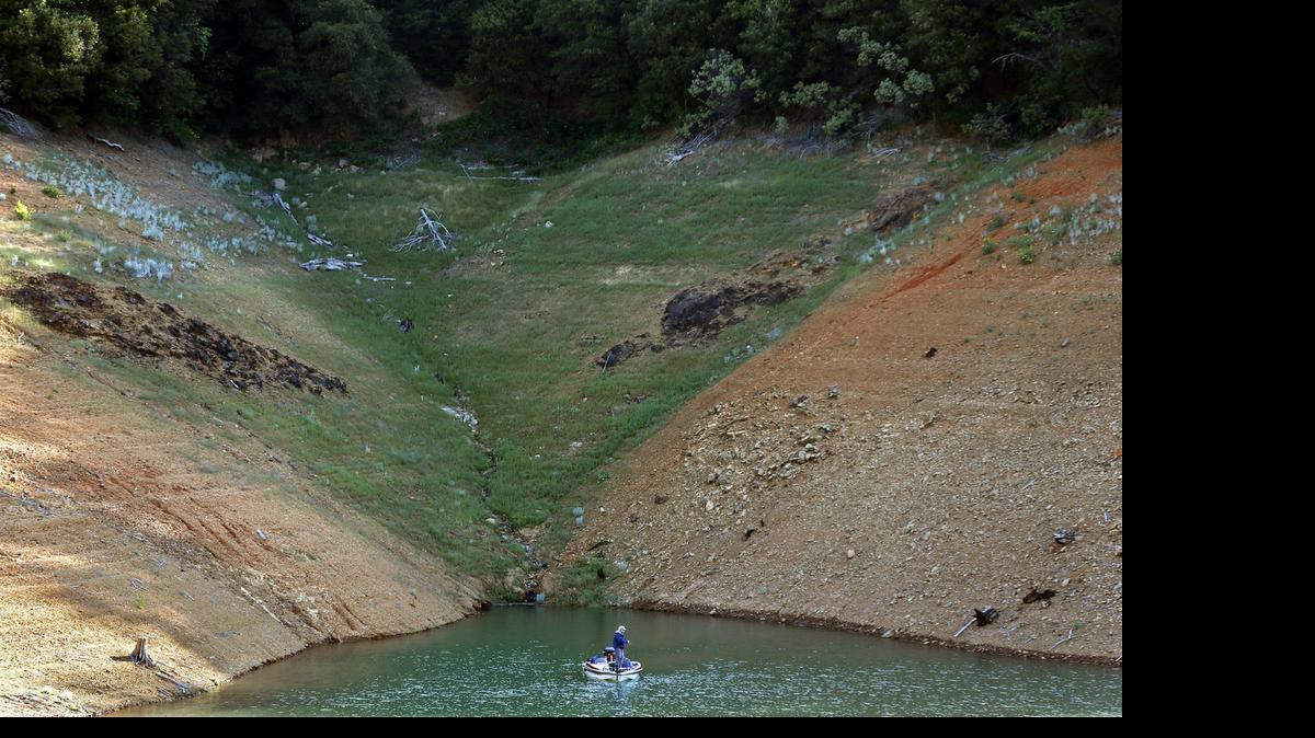 
As the California drought grinds into its fourth year, the exposed shoreline of Shasta Lake shows the steady drop in water level. The reservoir on the Sacramento River holds about 40 percent of the federal Central Valley Project’s stored supply.
