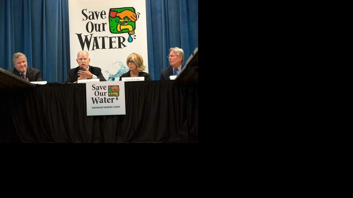 
Gov. Jerry Brown makes remarks about a meeting he had with with top agricultural, environmental and urban water agency leaders from across California in Sacramento on Wednesday. With him is Jay Ziegler of The Nature Conservancy, left, Nancy McFadden of the Governor’s Office, and Craig McNamara of the State Board of Food and Agriculture, right.
