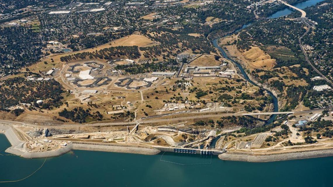 Folsom Dam, shown in June 2015, can hold 977,000 acre-feet of water. Its current level is above normal but nowhere near capacity.