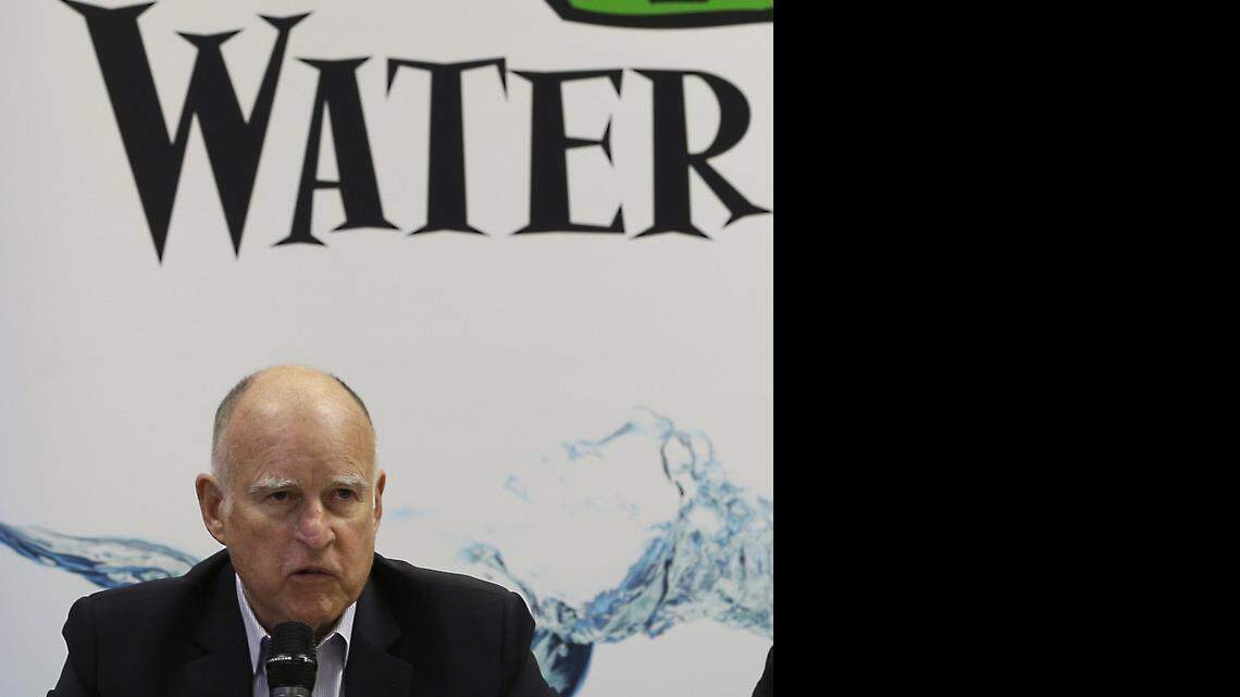
California Gov. Jerry Brown talks to reporters after a three-hour meeting on the drought with agricultural, environmental and urban water agency leaders from across California, Wednesday, April 8, 2015, at his Capitol office in Sacramento.
