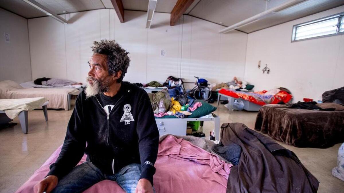 Martin Ross, 63, who has been homeless for the past 10 years, sits in his sleeping cot in one of the group rooms at the Navigation Center, a pilot program in San Francisco’s Mission District designed to help people like him.