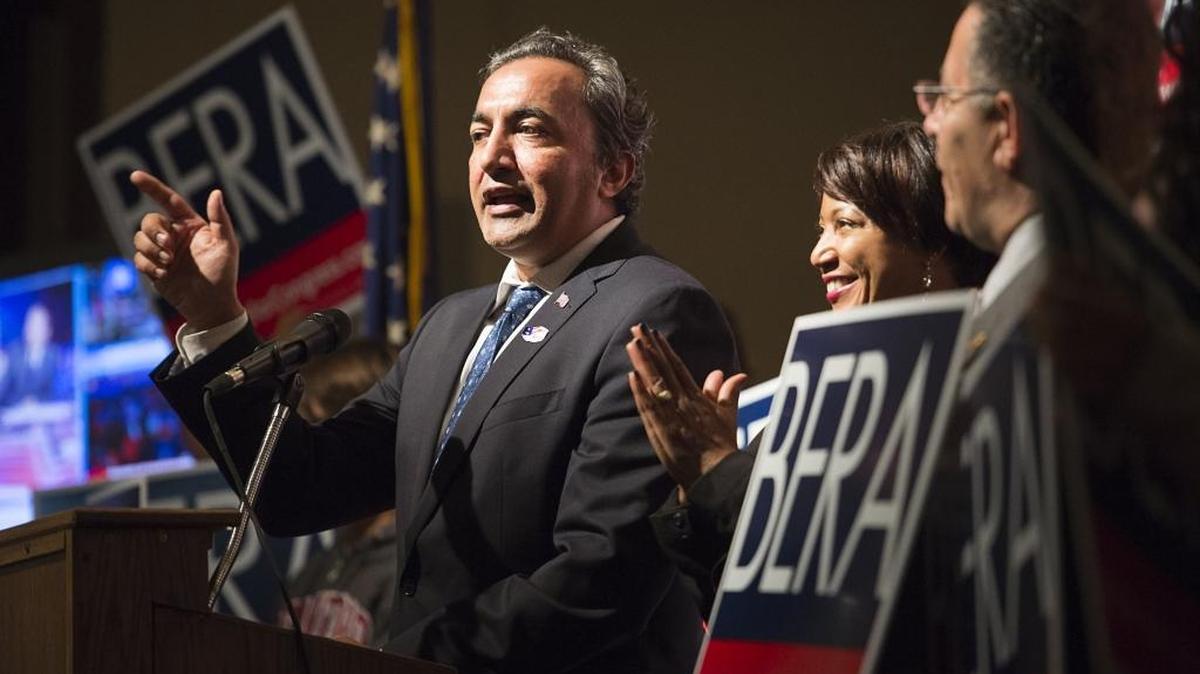Rep. Ami Bera, D-Elk Grove, and his wife Janine Bera, right, applaud as they await election returns Nov. 8 at the Elks Lodge in Carmichael. Bera won re-election over Sacramento County Sheriff Scott Jones, a Republican.