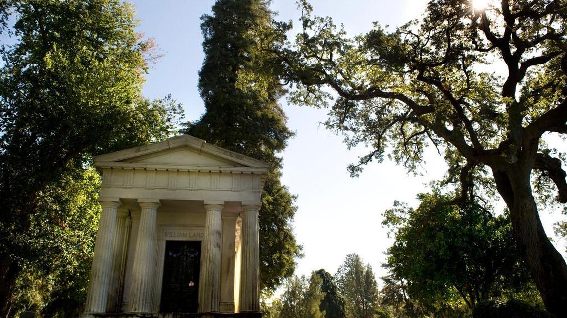 
A variety of trees frame William Land’s tomb in Sacramento. 
