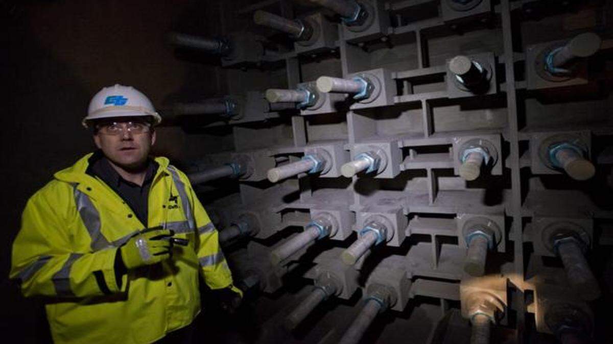 
Caltrans engineer Bill Casey shows anchor rods that secure the main cable of the new Bay Bridge suspension span in 2014. An investigation by The Bee found corrosion on some rods.
