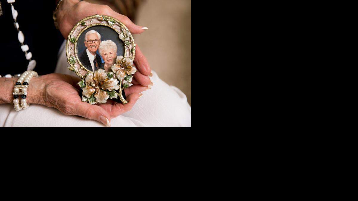 
Bonnie Nidiver of Paradise holds a photo of her late husband, Eugene, 88, a World War II Navy veteran who was active in his community. He died in June 2011, 10 weeks after he sought rehabilitation at Cypress Healthcare Center for injuries from a fall. 
