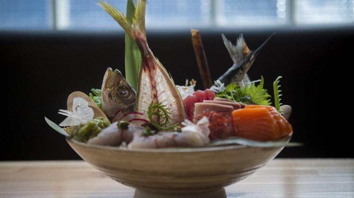The 15-piece sashimi mix, on ice, pickled wasabi and other accompaniments at Kru Contemporary Japanese Cuisine on Friday, Feb. 3, 2017, in Sacramento.