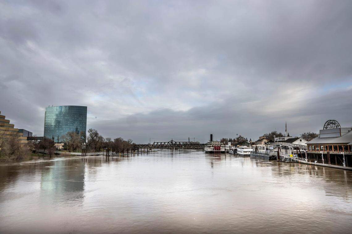 A view of the Sacramento River from the Tower Bridge shows the high water levels Friday, Jan. 6, 2023, during a break between storms.
