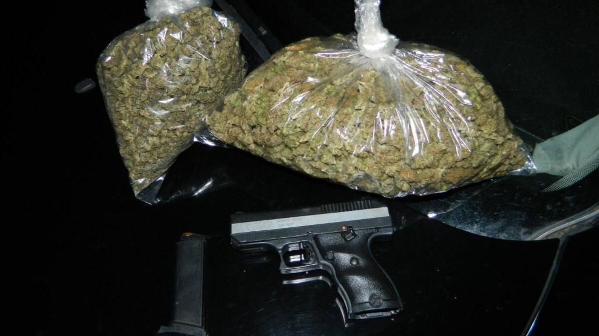 Police found a pound-and-a-half of marijuana in Lee’s trunk and a loaded handgun in his driver’s side door.