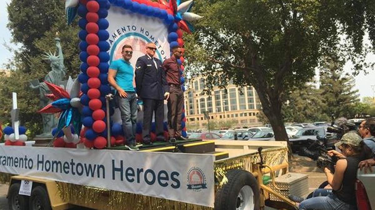 
Sacramento hometown heroes Alek Skarlatos, Spencer Stone and Anthony Sadler atop a float at the parade to honor them on Capitol Mall on Friday, September 11, 2015. 
