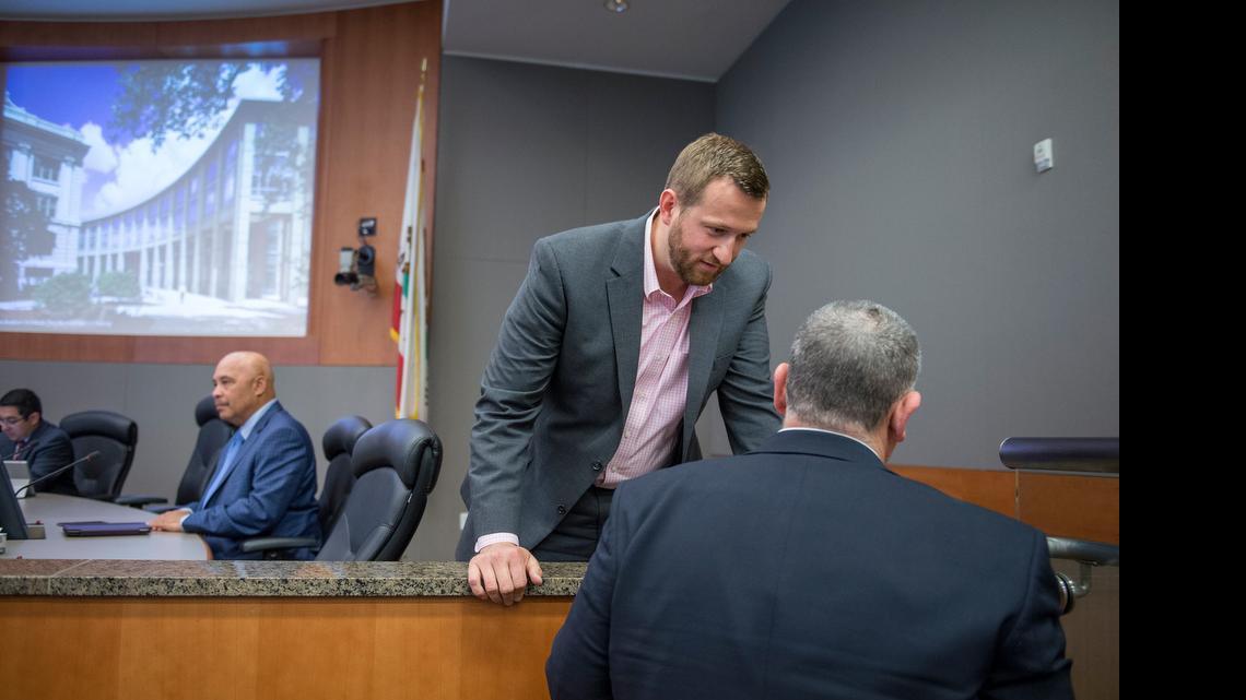 
Sacramento City Councilman Steve Hansen checks on details at Tuesday’s meeting.

