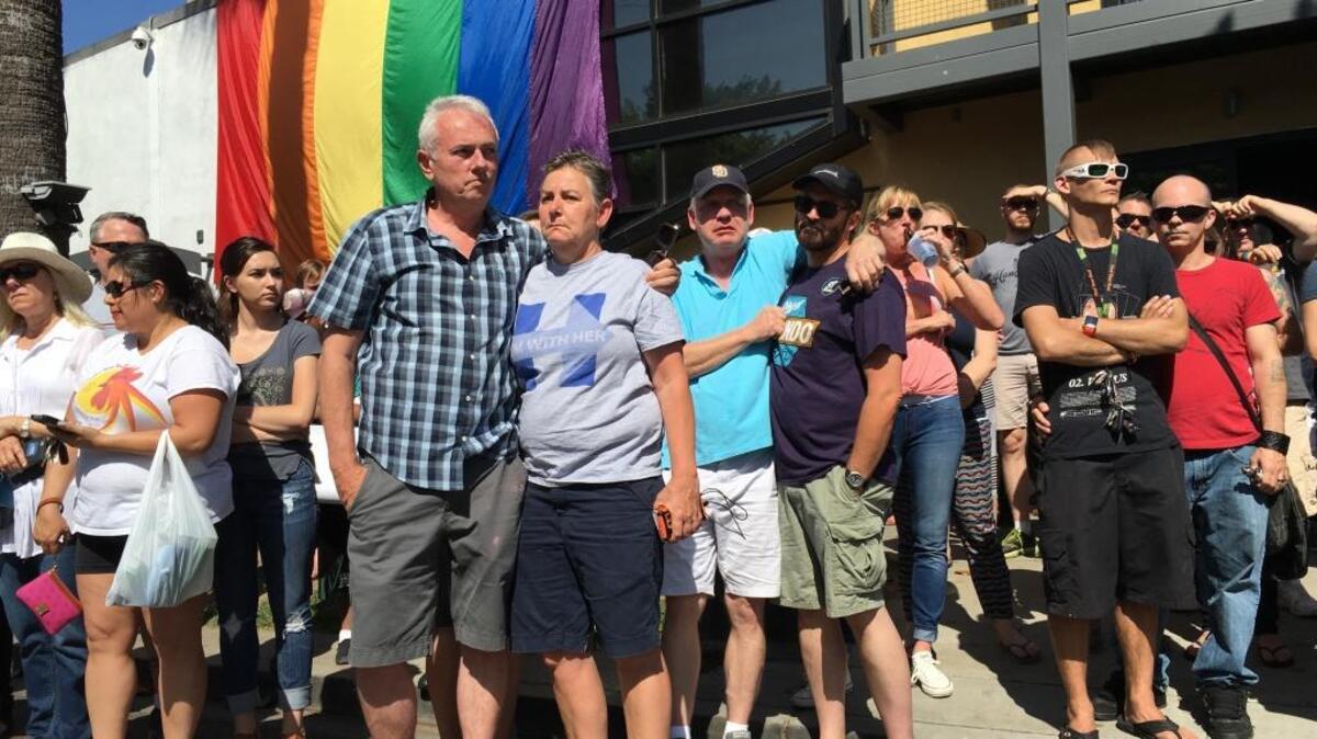 People gather outside Faces nightclub in Sacramento for a rally to show support for the victims of the Orlando massacre on Sunday, June 12, 2016.