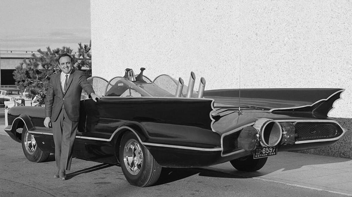 This 1966 photo shows designer George Barris with the original Batmobile in Los Angeles. Barris, who created television's original Batmobile, along with scores of other beautifully customized, instantly recognizable vehicles that helped define California car culture, has died at age 89.