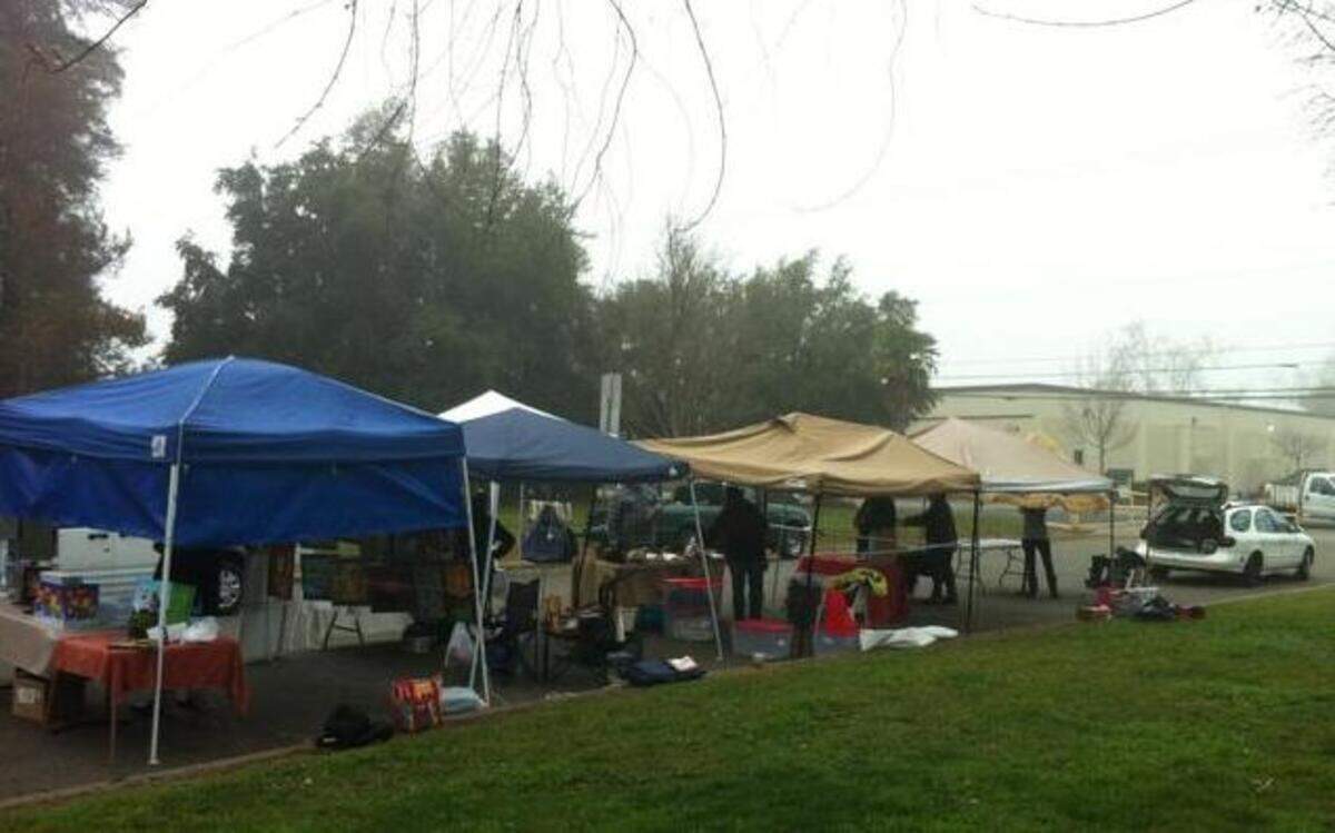
Fog lifts Sunday morning to reveal preparations for the farmers market in Land Park. Fog is expected to diminish as the week progresses in the Sacramento region as the long dry spell continues.
