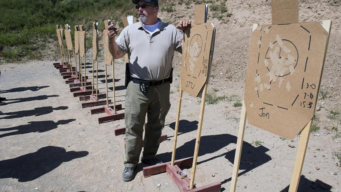 Instructor Joe Truesdale critiques his students during the concealed-carry class of One-On-One Firearms Training on Sunday April 17, 2016 in Sloughhouse, Calif. Sacramento County now has the third-highest number of concealed carry permit holders in California, trailing only Fresno and Orange counties.