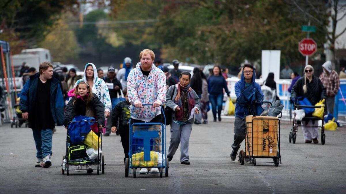 People pick up turkeys from the Sacramento Food Bank and Family Services last year.