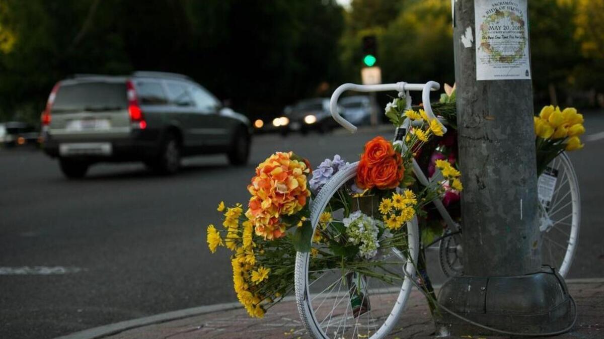 A “ghost bike’ sits at J and Carlson in front of Sacramento State University. Ride of Silence participants will stop there today.