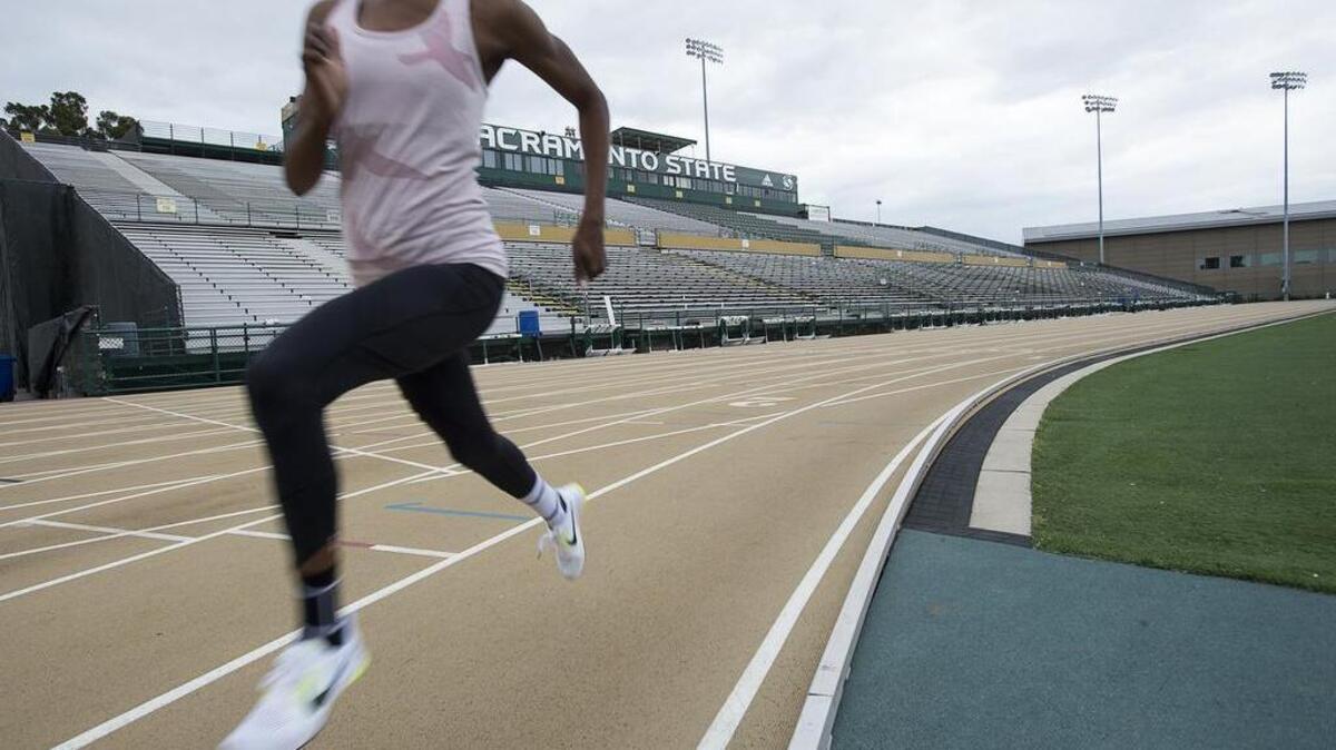Dominique Jackson runs on the track during her training session at Sacramento State on Tuesday in Sacramento. California State University is suing Mondo USA Inc. alleging that the $800,000 track it purchased in 2014 is fading, stained and “unsuitable” for its intended use. The track has been used for international and national track trials, along with other national and regional track and field events.