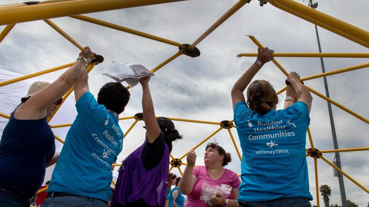 Volunteers build a play structure at West Sacramento’s Bryte Park in 2015.