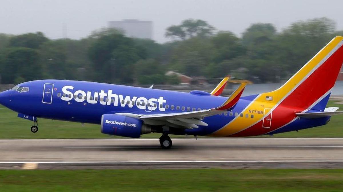 In this April 23, 2015, file photo, a Southwest Airlines jet takes off from a runway at Love Field in Dallas.