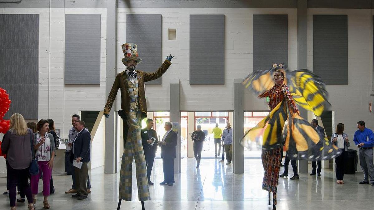 Stilt walkers Richard Dalton and Star Child of the Stilt Circus greet visitors during the unveiling of the newly renovated Placer County Fairgrounds.