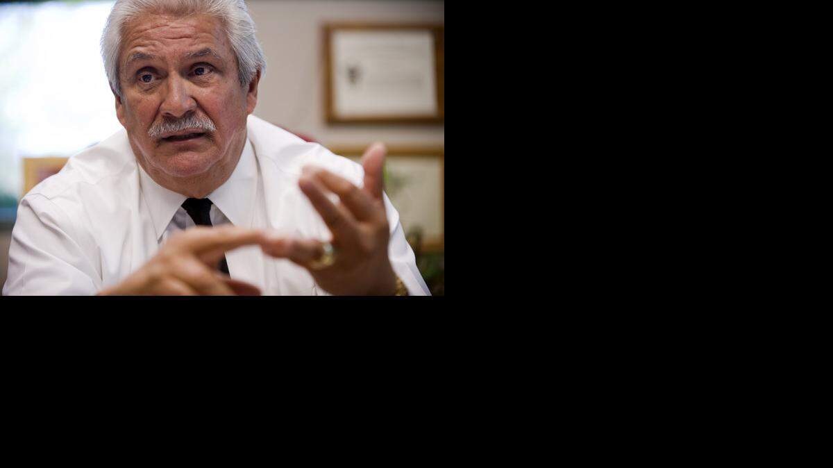 
Yolo County Sheriff Ed Prieto is shown in his office in 2009.


