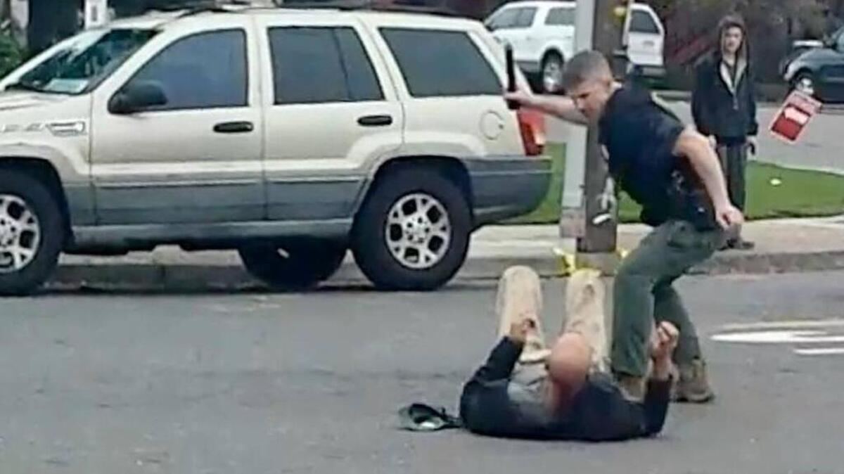Sacramento County sheriff’s Deputy Paul “Scotte” Pfeifer strikes John Reyes of Carmichael with his flashlight in this image from a video shot by witness Michael White of Carmichael. Editors’ investigation pick No. 1.