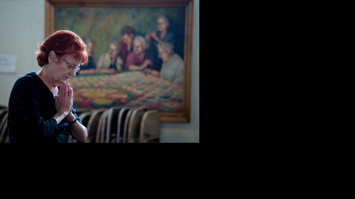 
Connie Jones, 65, participates in a blessing at the start of yoga class at Countryside Community Church on Dec. 18 in Esparto. The class is part of the 1001 New Worshiping Communities program of the Presbyterian Church (USA).
