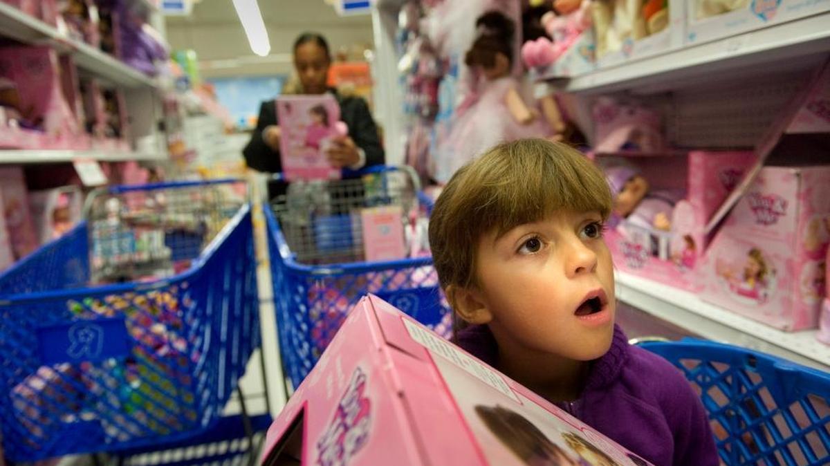 Jenni Nelson, 8, of Arden Park is all eyes over the dolls at Toys R Us on Arden Way in this 2009 file photo .