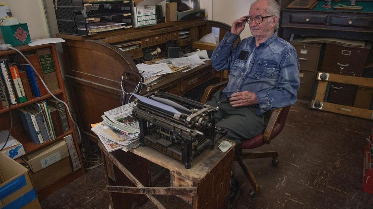 Newt Wallace, 96, reminisces about his nearly 70-year career at the Winters Express newspaper on Thursday Wallace, who calls himself the “world’s oldest paper boy,” delivered his last load of weekly papers by car Wednesday to the rural communities of Madison, Capay and Esparto.