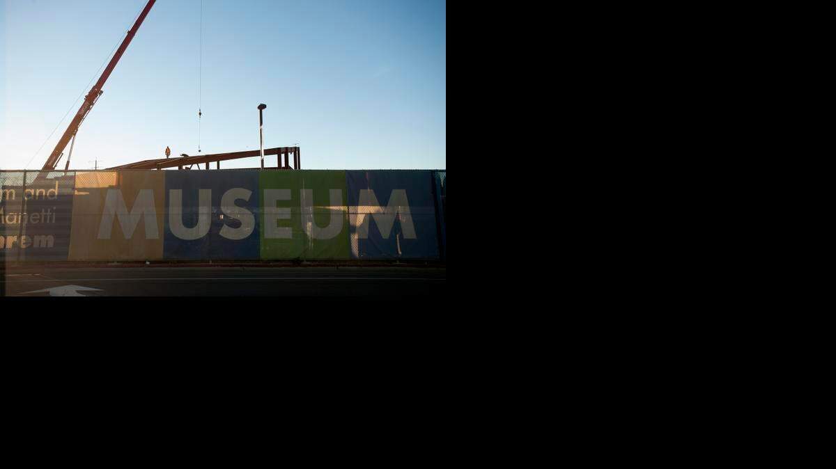 
Steel workers work with a crane operator to assemble the steel I-beams at the Shrem Musuem of Art at UC Davis in January. The prefabricated beams are lowered and bolted into place.
