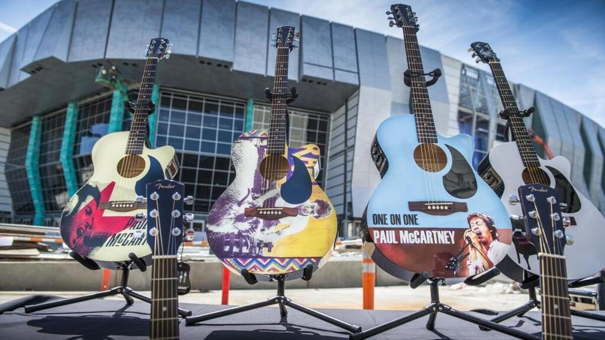 Guitars are lined up in front of Golden 1 Center as the Sacramento Kings announce Paul McCartney will inaugurate the new arena in October.
