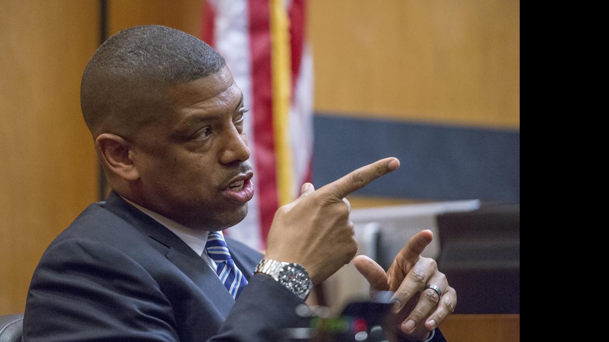 
Sacramento Mayor Kevin Johnson testifies in the arena court trial on Tuesday. He admitted in his testimony that he deleted arena-related text messages he had been advised to keep.
