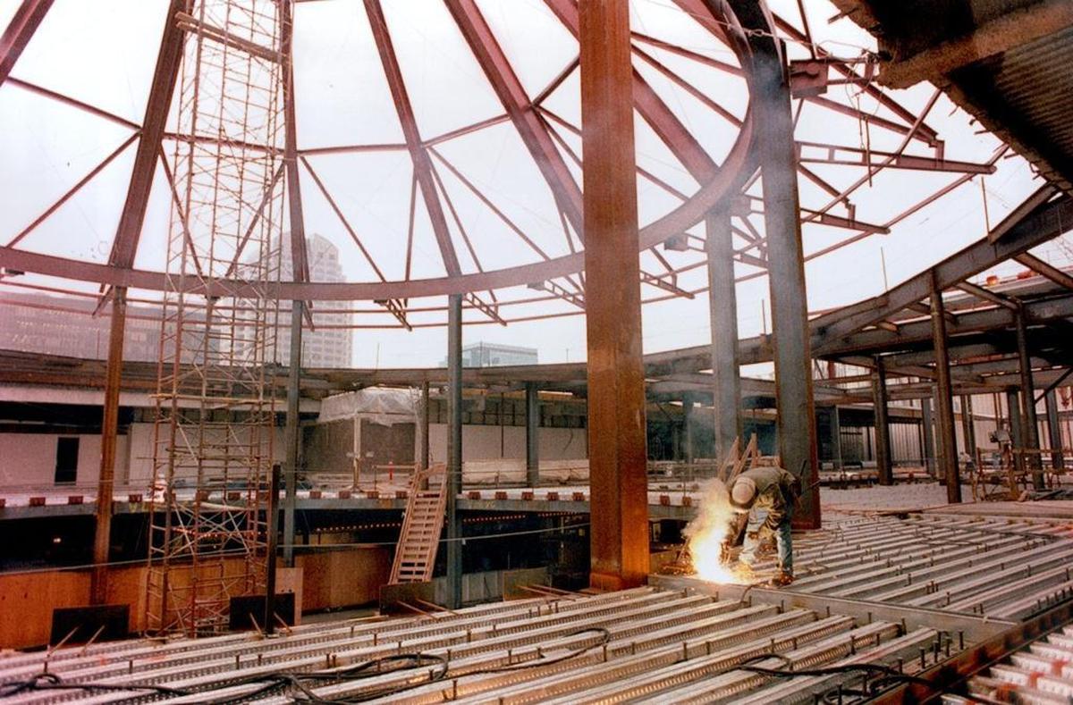 Welder Ralph Walker works on the expansion of Downtown Plaza in January 1993. The renovation expanded the mall’s square footage by half, adding a second level and movie theaters.