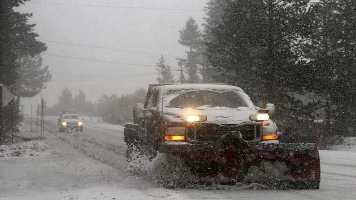 
Snow is cleared from Donner Pass Road in Soda Springs, Calif., during one of a series of December storms that gave the region a hefty early snow pack.
