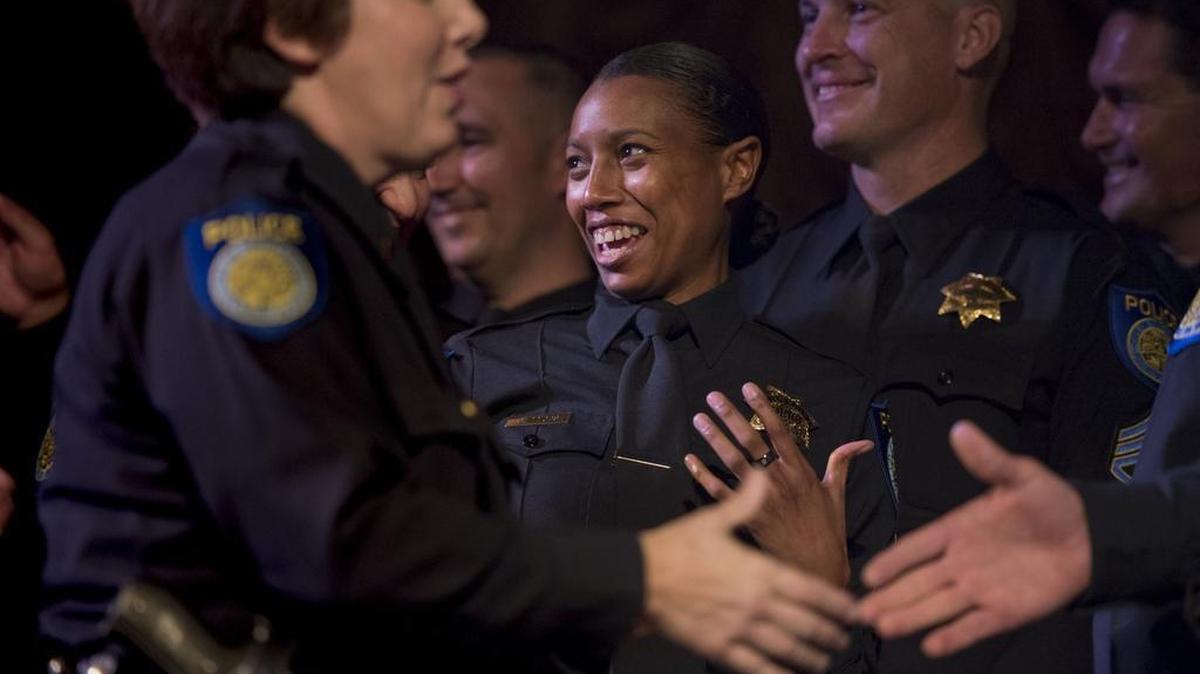 Sacramento police Sgt. Sabrina Briggs celebrates with her fellow officers following the department’s promotions ceremony at the Crest Theatre on Friday, December 1, 2017. Briggs is the first African-American woman to be promoted to sergeant in the Sacramento Police Department.