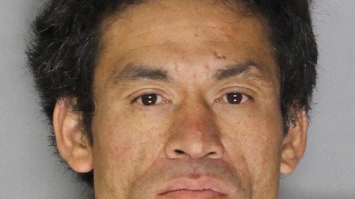 Sacramento police say suspect Amphone Sayabouapheth threw a pipe bomb and pointed a gun at officers Saturday before barricading himself in a Oak Park home.