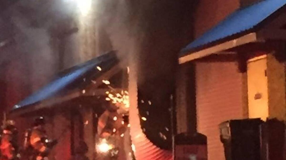 Fire crews battle fire in commercial building on Spring Hill Drive in Grass Valley.