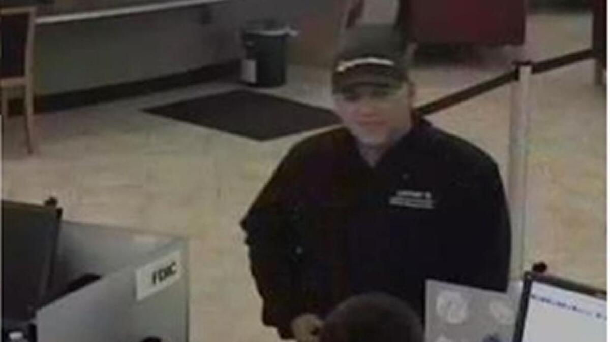 A man sought in connection with the robbery of a Wells Fargo bank in Rocklin is shown in a surveillance photo.