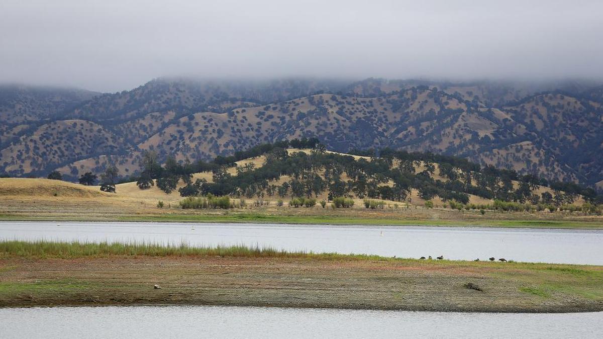 Lake Berryessa is seen with parts of California’s newest national monument in the background, Friday, July 10, 2015, near Berryessa Snow Mountain National Monument, Calif. California’s newest national monument covers hundreds of thousands of acres from marshes to the mountain peaks 6,000 feet above them. Federal protection will let an entire coastal range better weather the warming of climate change, supporters say. (AP Photo/Eric Risberg)